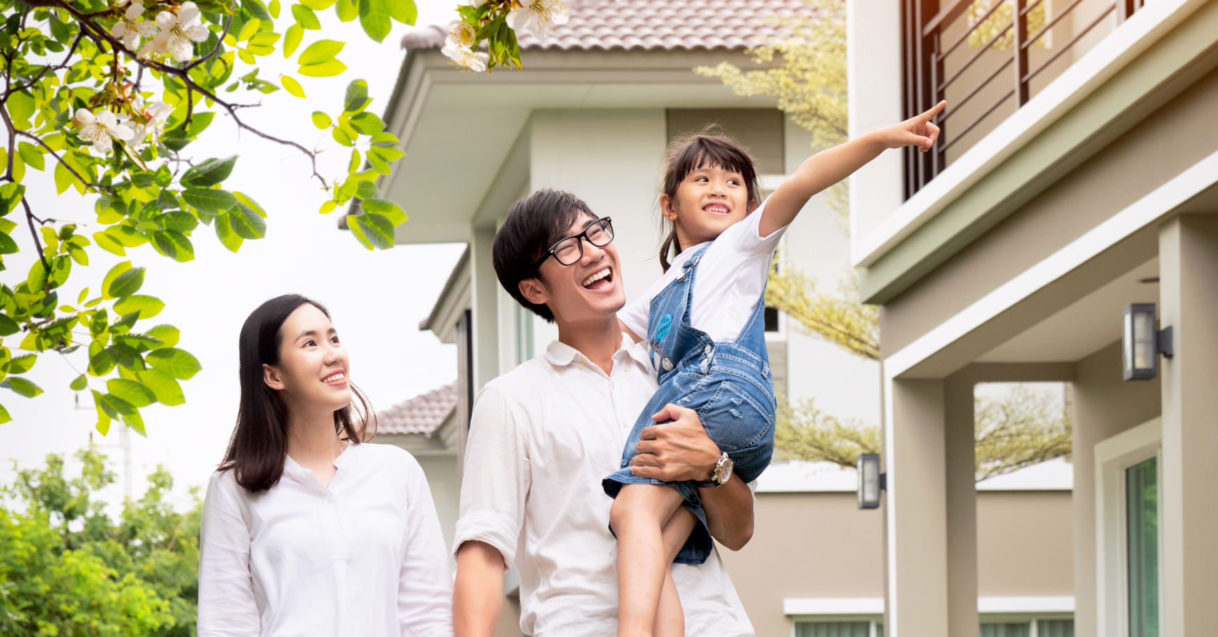 family walking down neighborhood sidewalk