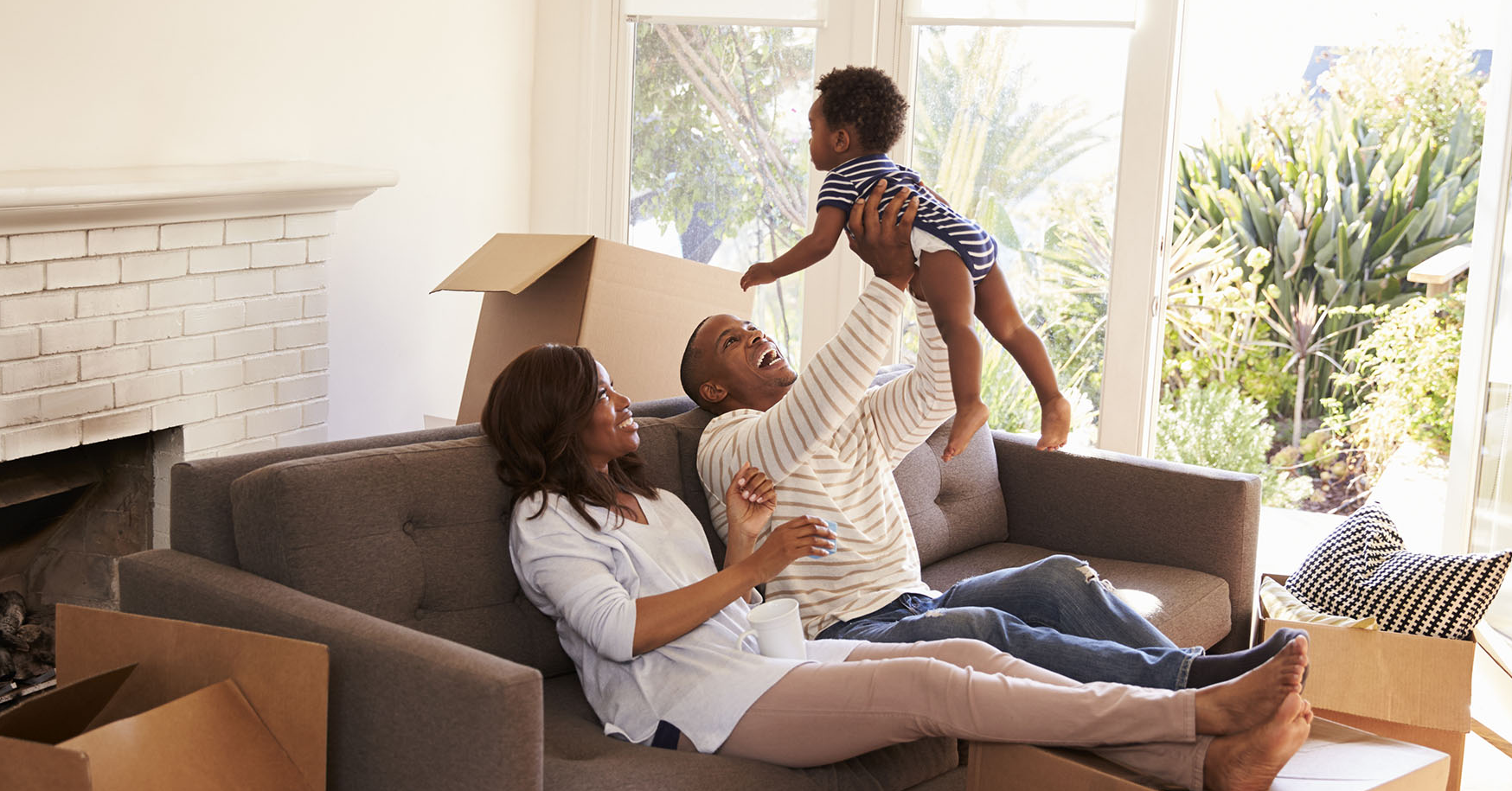 family relaxing on the couch